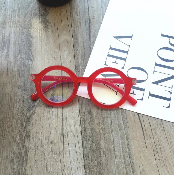 Retro round plastic frame glasses with anti-blue light filter in black, pink, leopard, red, white, or yellow.