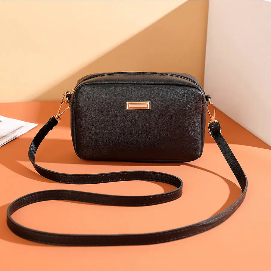 Women's solid colour PU shoulder bag with three-dimensional pockets in horizontal square shape