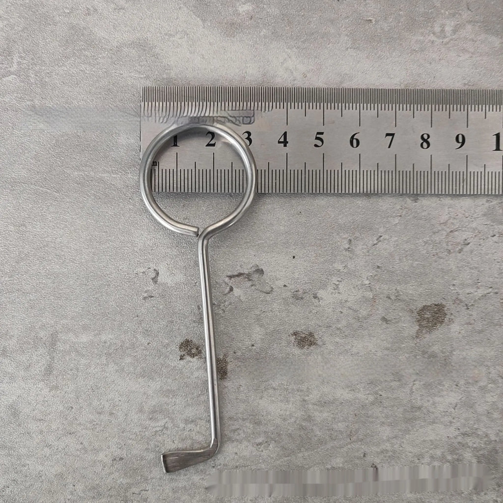 Two alloy steel wrench tools from a portable household repair set.