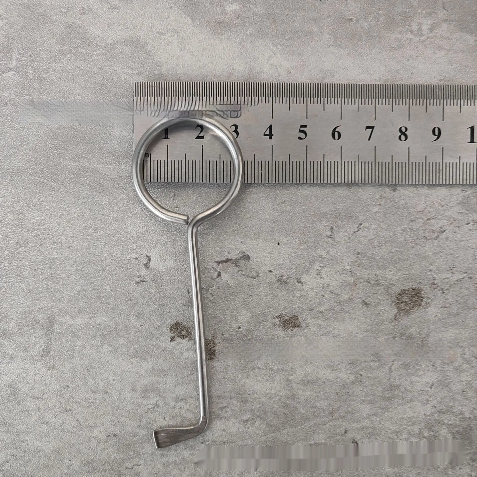 Two alloy steel wrench tools from a portable household repair set.