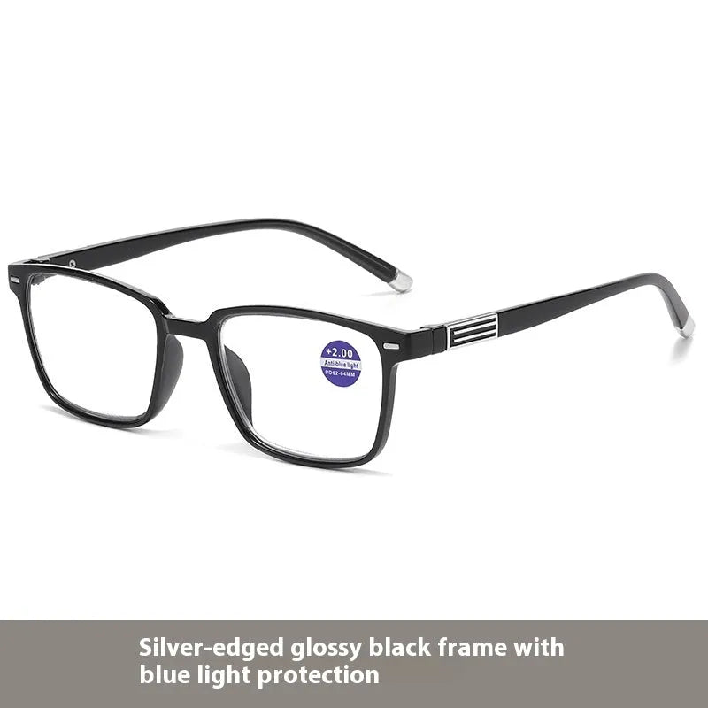 Multifocal reading glasses with colour changing, anti-blue light PC lenses in a black and silver frame style.