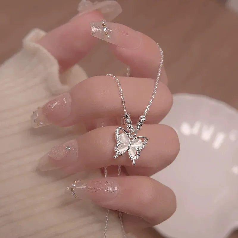 Women's 925 silver butterfly necklace with square opal pendant on cross chain showing 41-50cm length