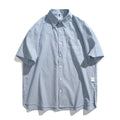 Blue striped short-sleeved overalls shirt with a loose cardigan fit