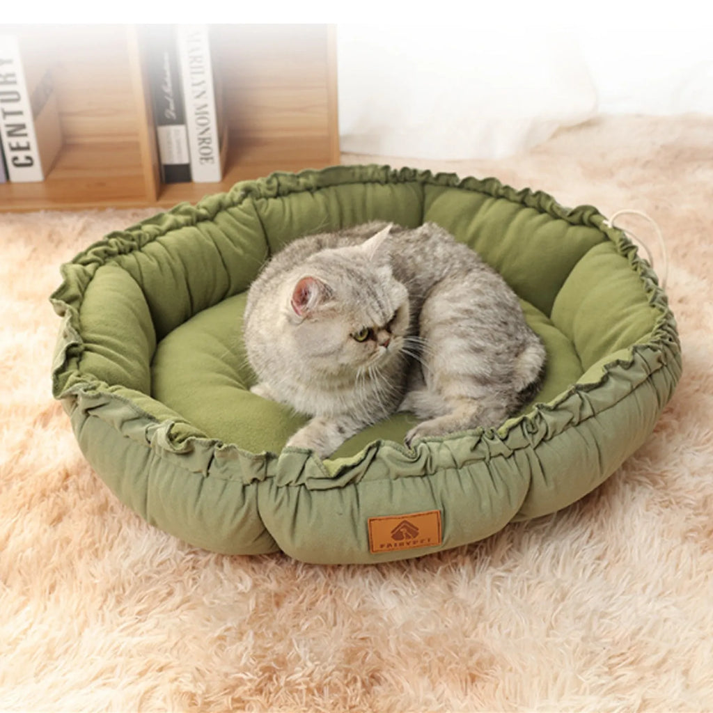 Reversible grey and green donut cat bed with raised rim in three sizes