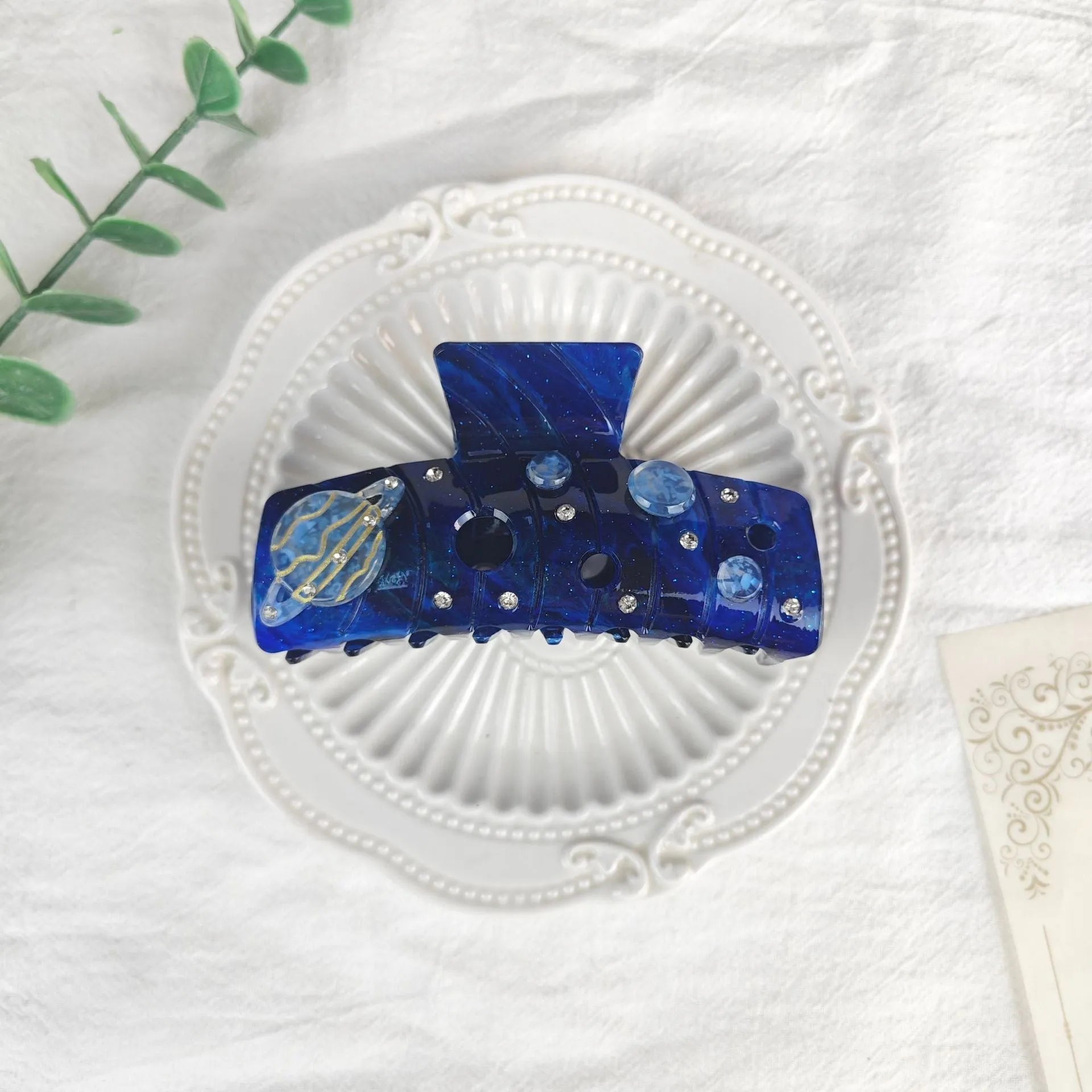 Oversized celestial barrette hair clip with star moon design in starry sky colours