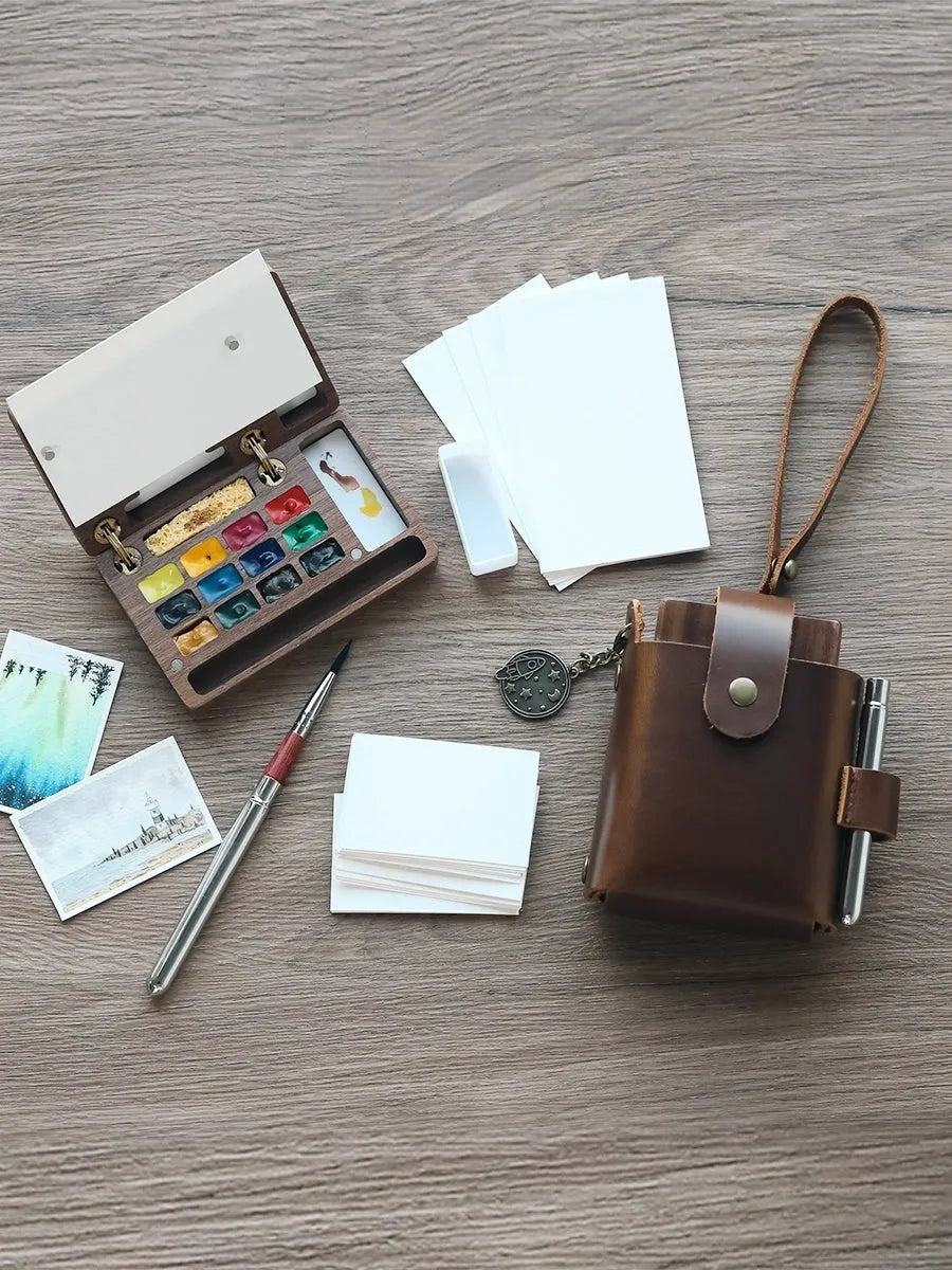 Mini walnut wood watercolour paint box with internal compartments for pigment pans