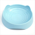 Blue ceramic dog slow feeder puzzle bowl with maze cups for large breed dogs.