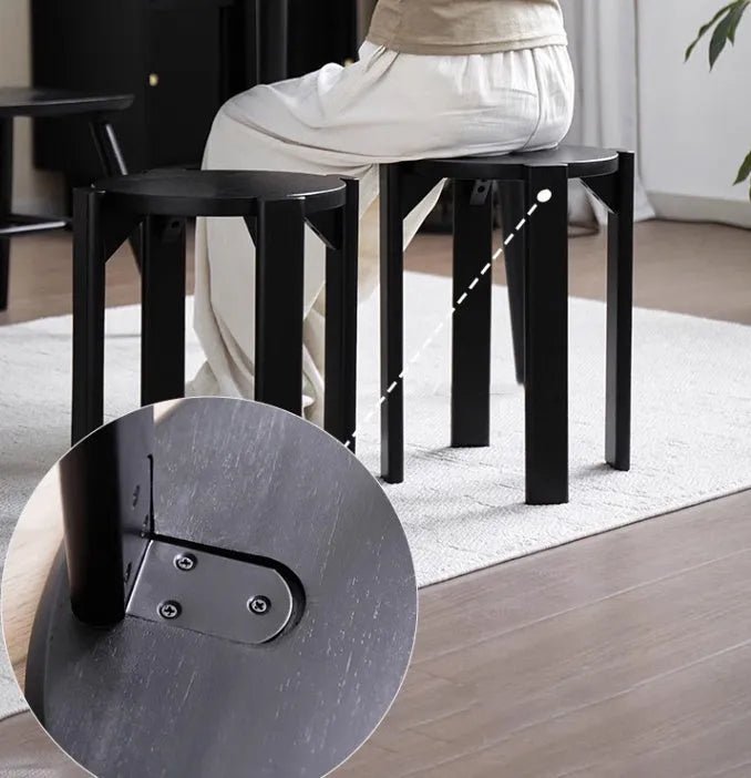 Stackable iron dining stool in modern round design with four colour finish options