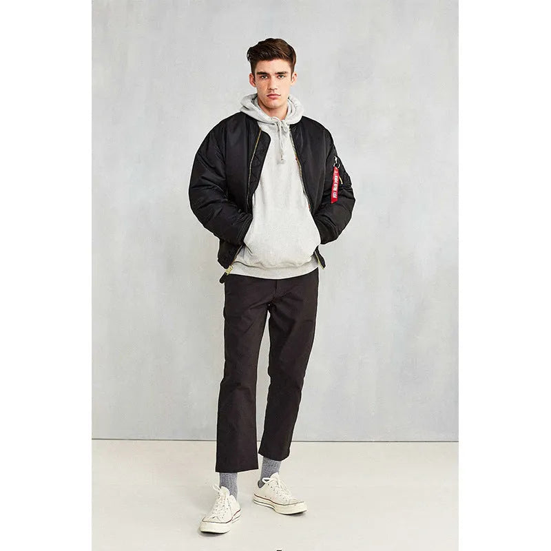 Men's loose fit pilot jacket in army green, showing cotton padding and double-sided nylon construction.