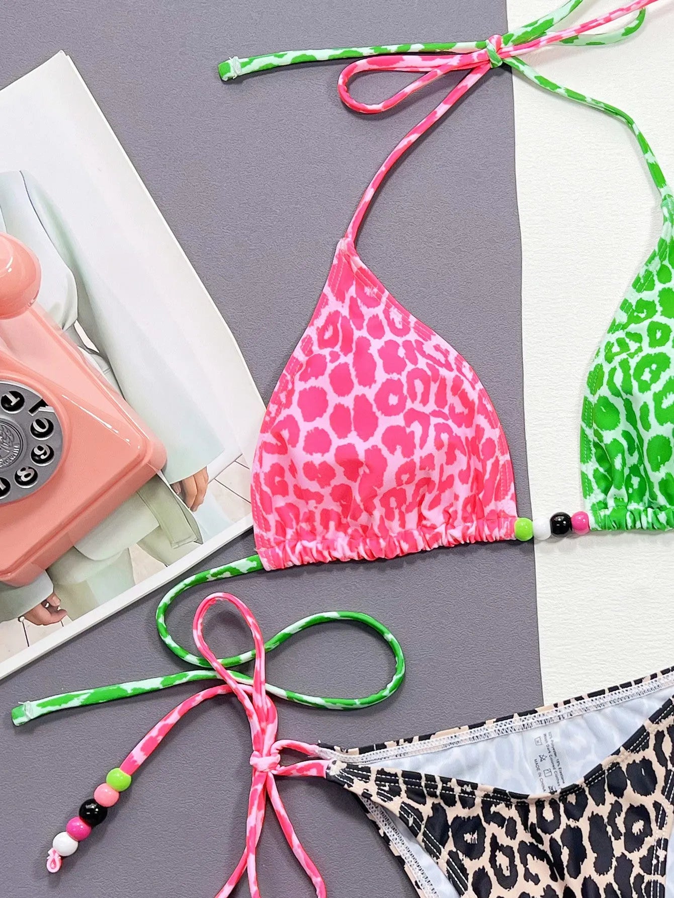 Leopard print women's bikini swimsuit with briefs style and lining.