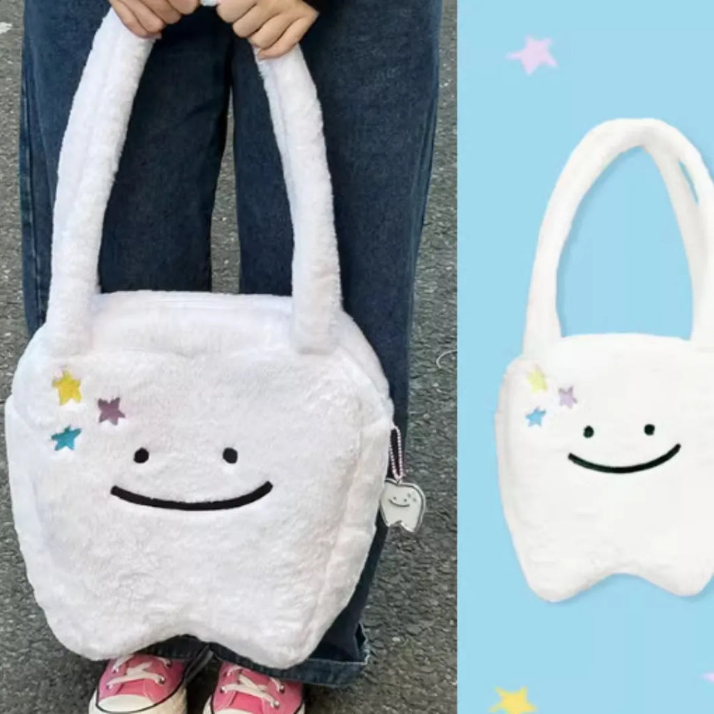 White plush shoulder tote bag with cute teeth pattern and front zip closure
