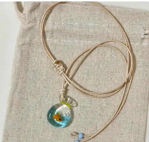 Women's pendant necklace with coloured glaze skirt joker charm on cotton linen clavicle chain