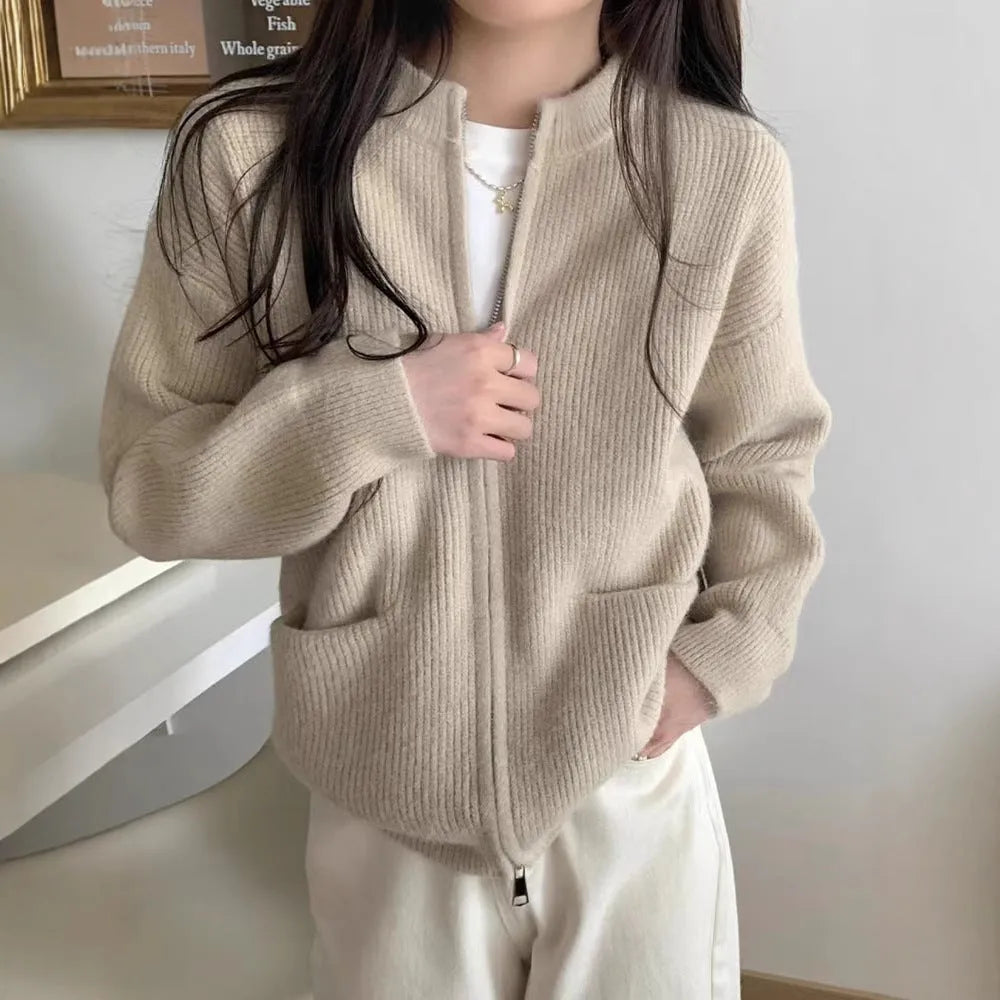 Beige soft glutinous sweater coat cardigan with long sleeves on hanger