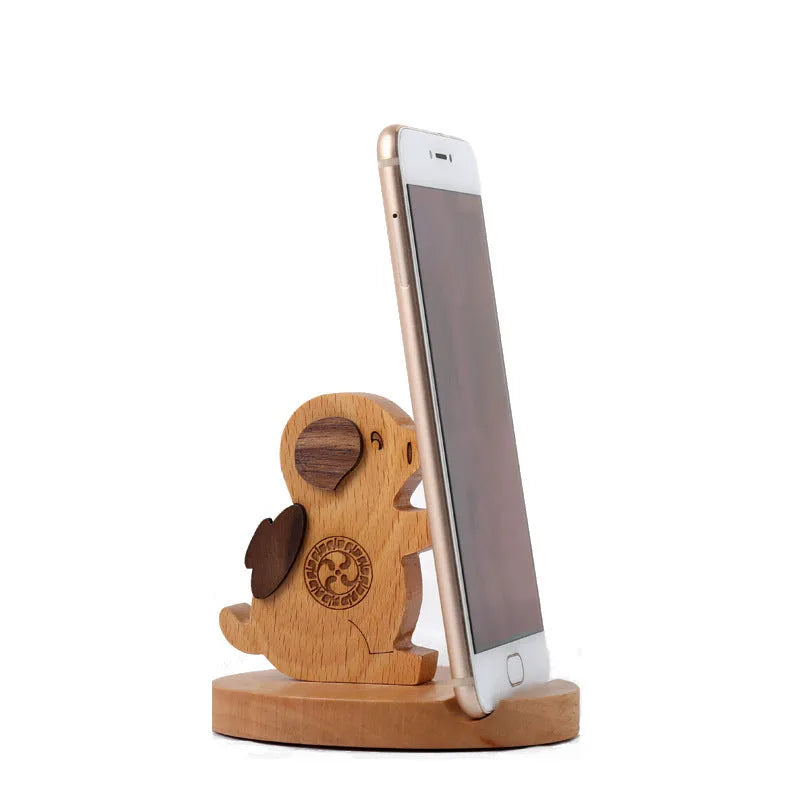 Solid beech wood mobile phone holder with detailed resin animal carving in choice of 22 animal styles
