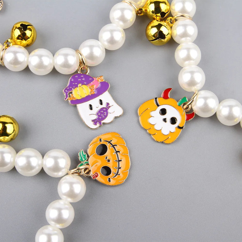 Halloween cat collar with simulated pearl necklace and purple ghost pumpkin ornament