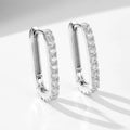 Sterling silver oval zircon ear clip earrings with geometric design in white or yellow colour