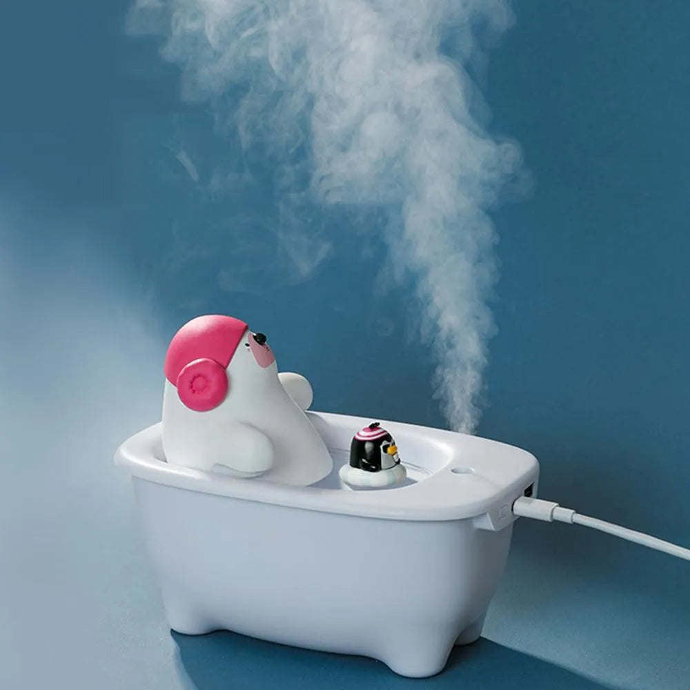 White USB-powered air humidifier with large water tank on a desk
