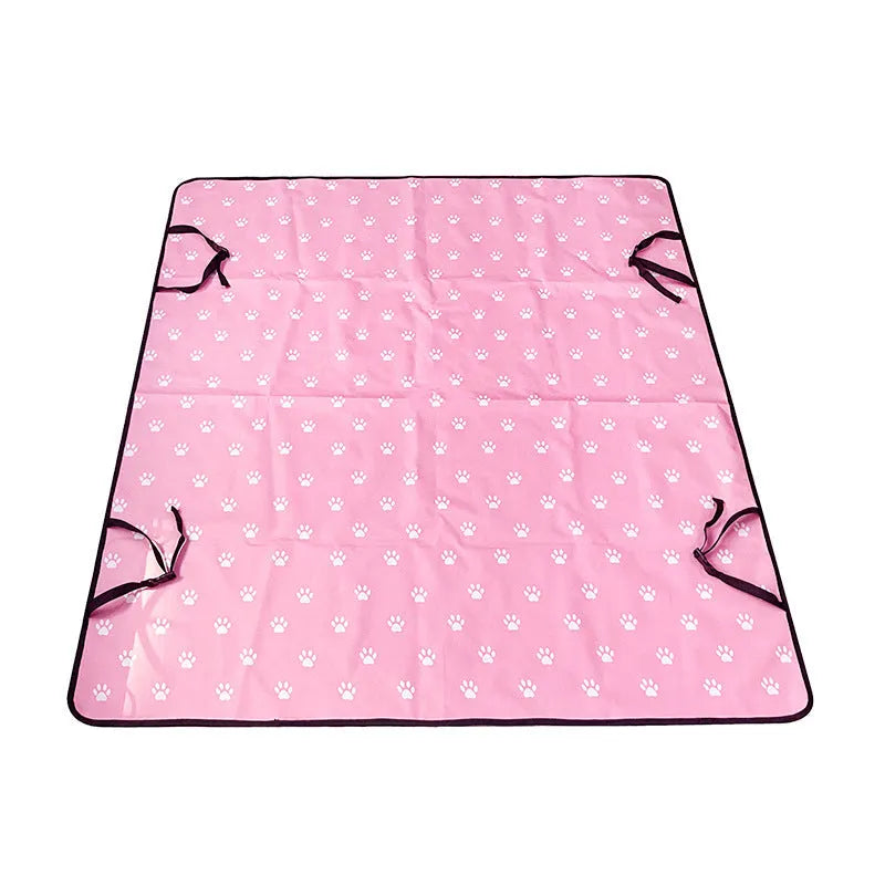 Grey car pet mat with dog bone print on rear car seat protecting upholstery