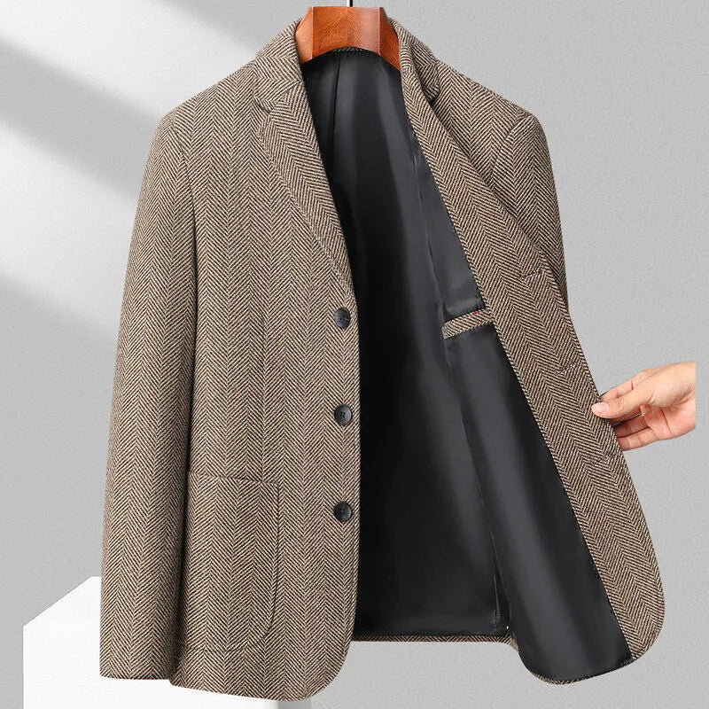 Man wearing a loose-fit solid colour polyester coat for spring or autumn.