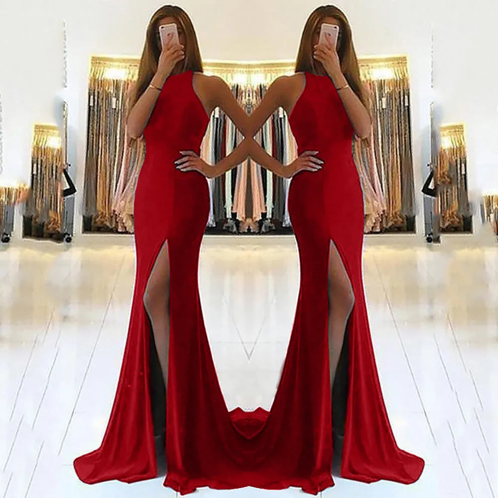Long red evening dress with hollow pattern detail, high waist, and large swing skirt