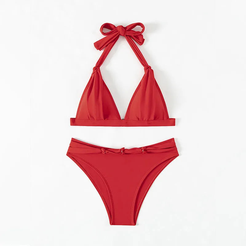 Women's red lace-up halterneck bikini set for swimming and beach activities