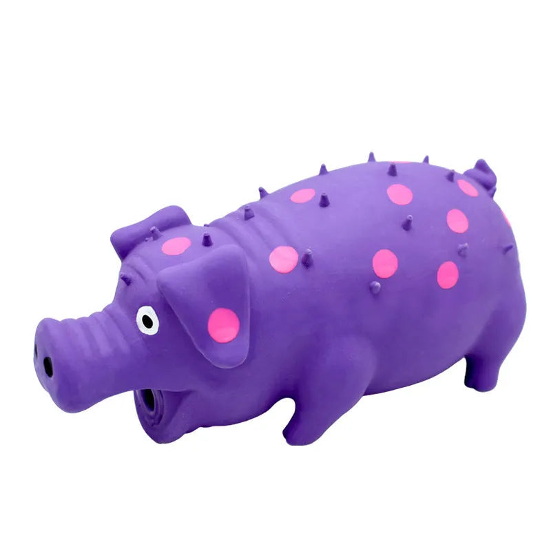 Blue latex pig-shaped dog chew toy with textured surface and squeaker inside.