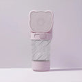 Green, pink, or white 3-in-1 portable pet water bottle with attached strap, food container, and bag dispenser.