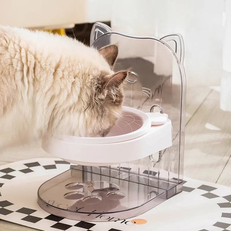 Grey cat ear design pet bowl with removable hanging cage attachment on white background