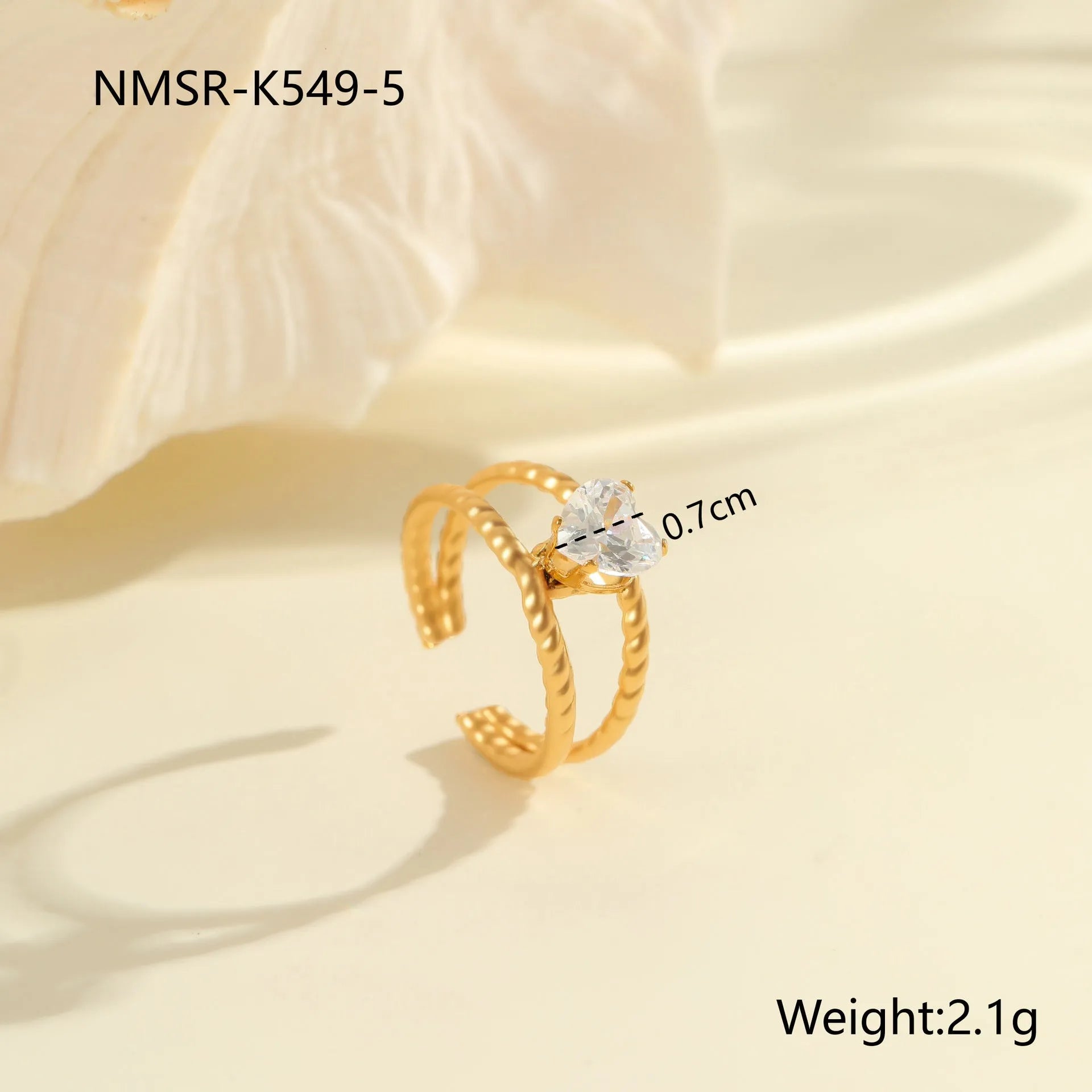 Gold electroplated stainless steel ring with zircon geometric design and open mouth adjustable fit