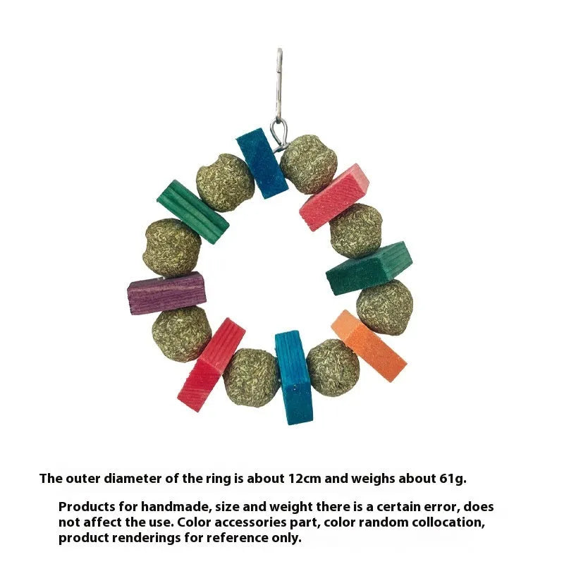 Applewood and woven straw ball chew ring toy for small pets on a white background.