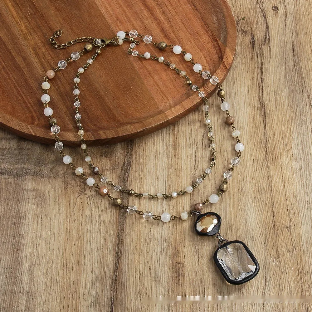 Tribal style two-layer necklace with stone and glass pendant on adjustable chain