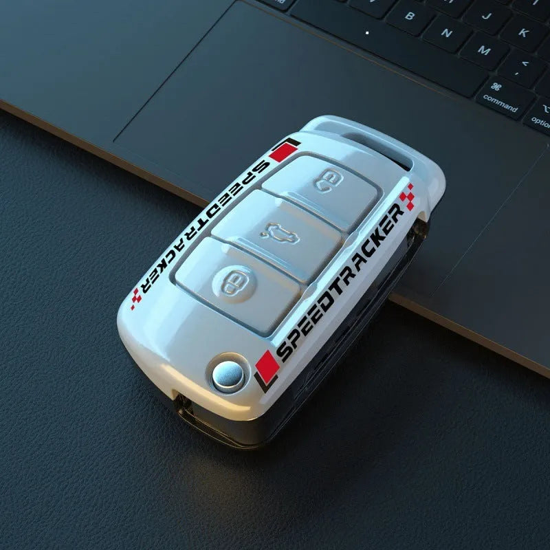 Carbon fibre style car key cover with mirrored finish in white and carbon colour options