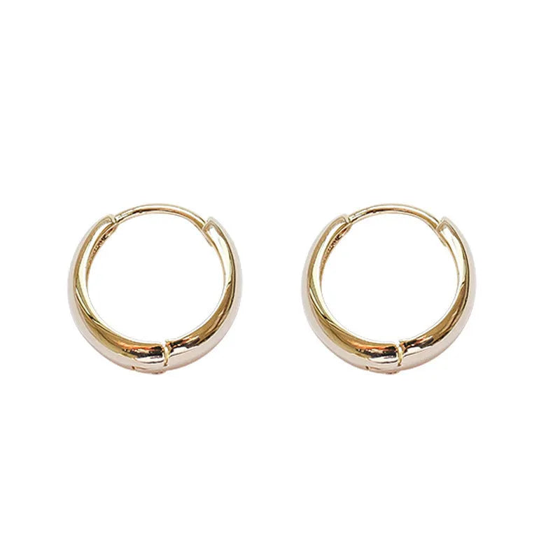 Women's geometric water drop earrings in copper with gold and silver electroplated finishes