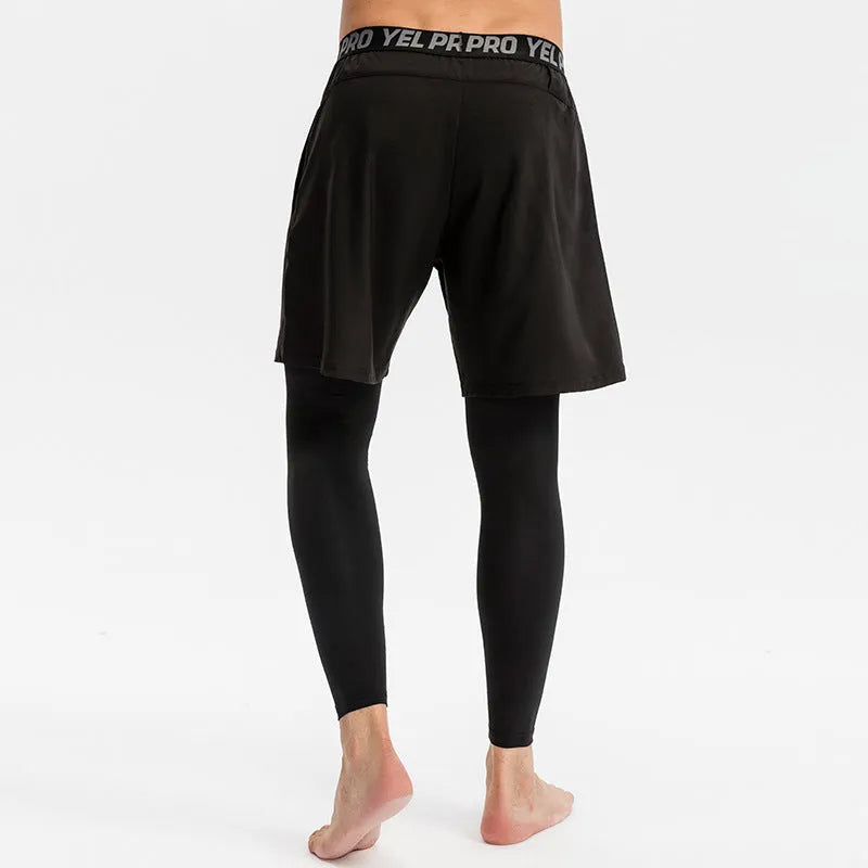 Man wearing grey elastic quick-drying sports trousers for fitness exercise.