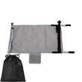 Portable grey nylon children's aircraft seat pedal extender with a matching drawstring pocket.