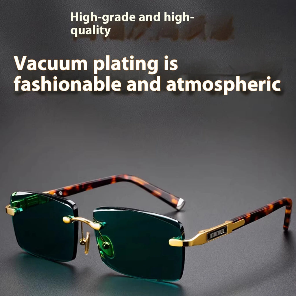 Dark green frameless crystal sunglasses on a case with a lens cloth.