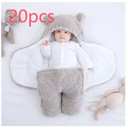 Cotton blend quilted baby sleeping bag wrapper in light blue, shown laid flat.