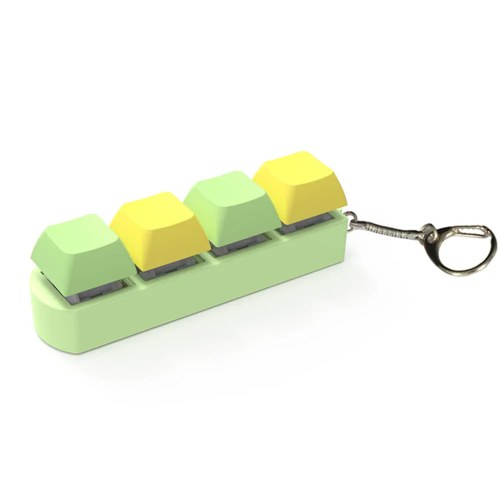 4-key mechanical keyboard switch tester with transparent bottom shell on desk