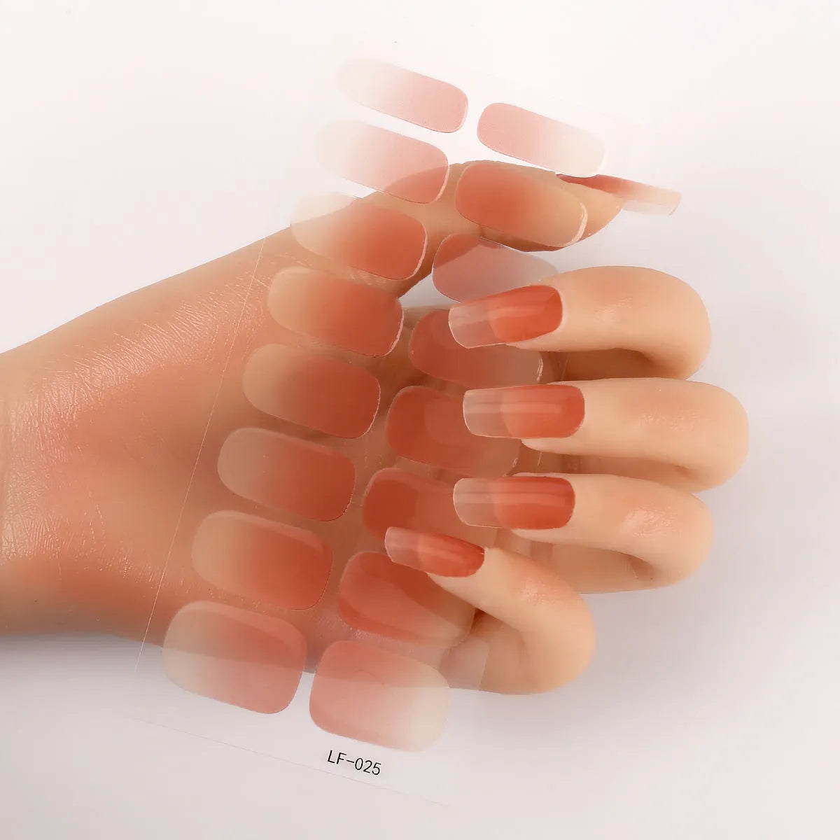 Sheet of 16 solid colour nail art sticker designs including cross, rose, and leopard print patterns.