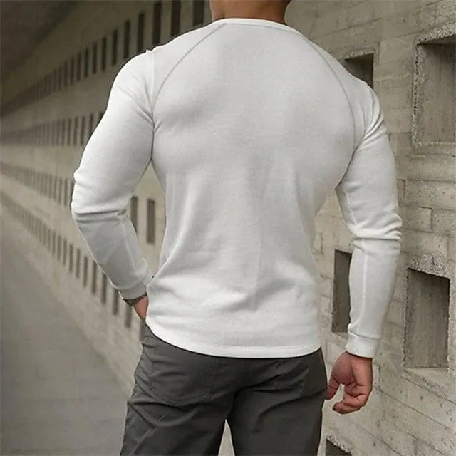 Men's white Henry collar long sleeve T-shirt with cotton blend fabric on hanger