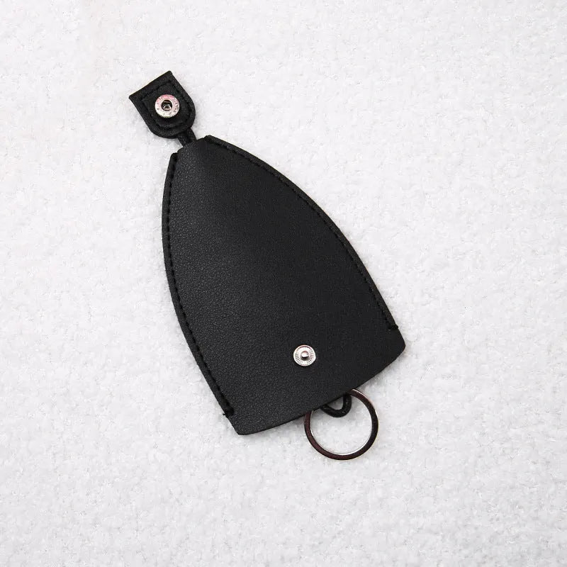 Cartoon pull-out car key case in PU leather with colourful designs measuring 14 x 7.5 cm