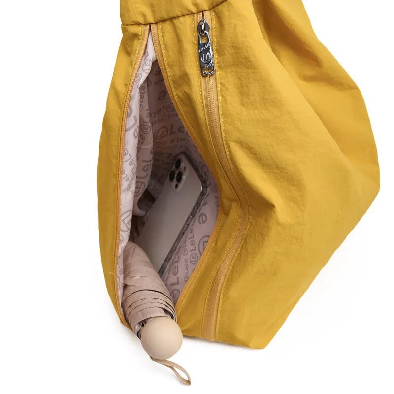 Women's heart-shaped nylon crossbody bag in black, yellow, khaki or blue colours