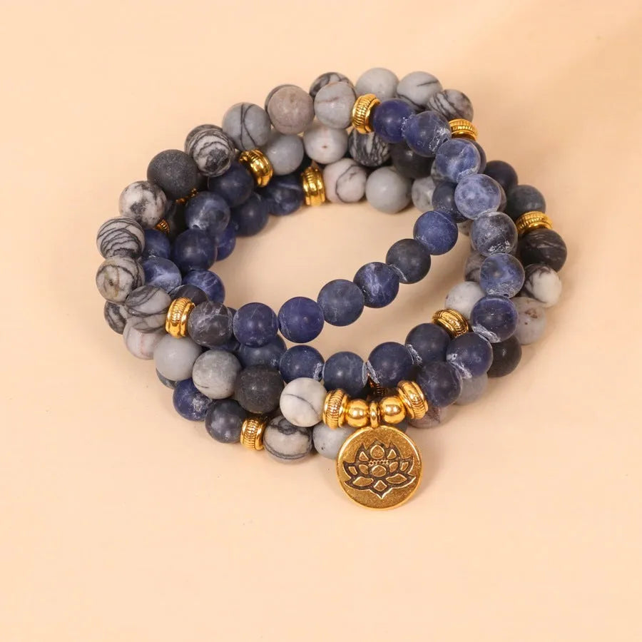 Blue patterned network stone bead multi-layer bracelet with alloy clasp on wrist