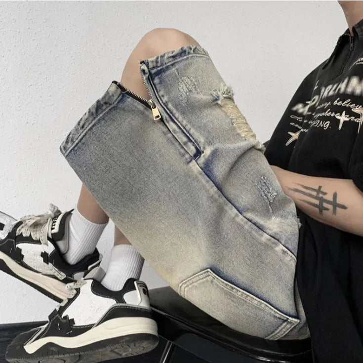 Blue retro denim shorts with wide-leg loose fit and tattered distressing details.