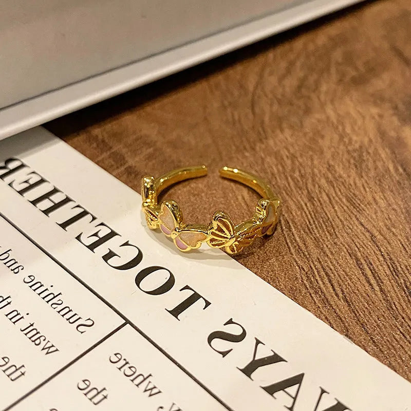 Copper women's ring featuring a creative Chinese butterfly design, available in multiple colours.