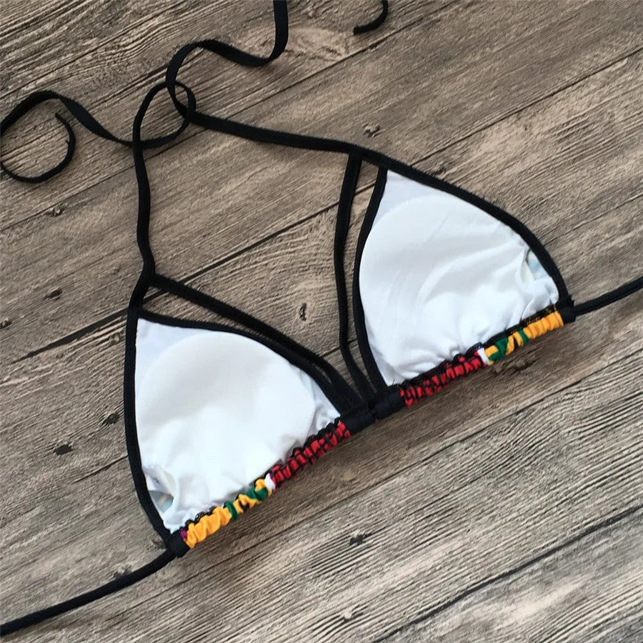 Women's high-waist bikini swimsuit with digital pattern and backless design.