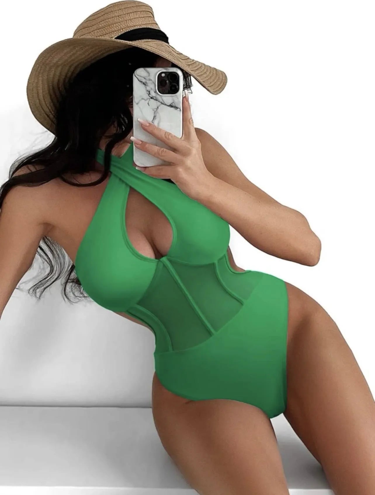Women's black one-piece swimsuit bikini made from nylon and spandex fabric on a mannequin.