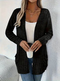 Women's loose-fit long sleeve cardigan with pockets in granny grey, shown on a hanger.