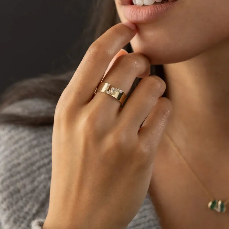 Gold electroplated zircon ring for women shown in size 8.