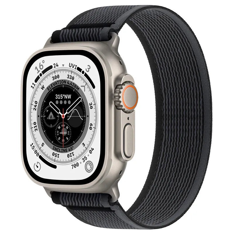 Black nylon Apple Watch band with integrated ring closure on a 44mm watch case.